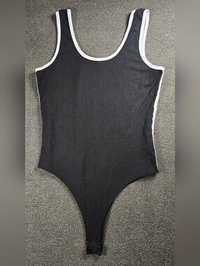Discreet Black One-Piece Bodysuit with White Trim